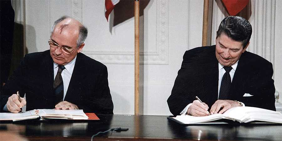 Gorbachev and Reagan sign the INF Treaty.